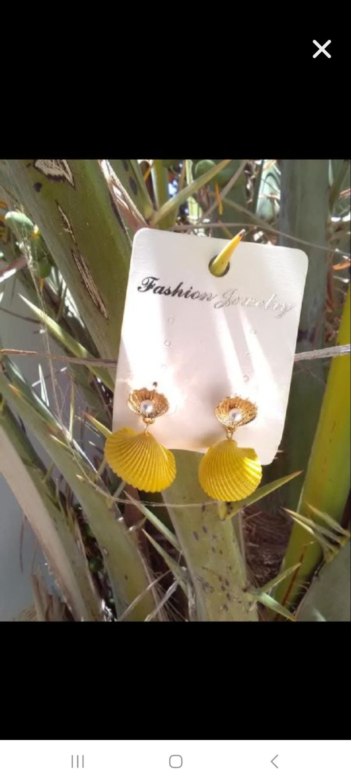 Boucle coquillages jaune 