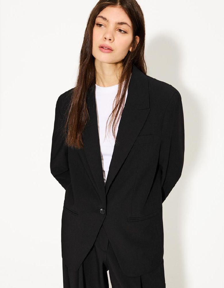Blazer chic neuf sans ticket 40 forte 