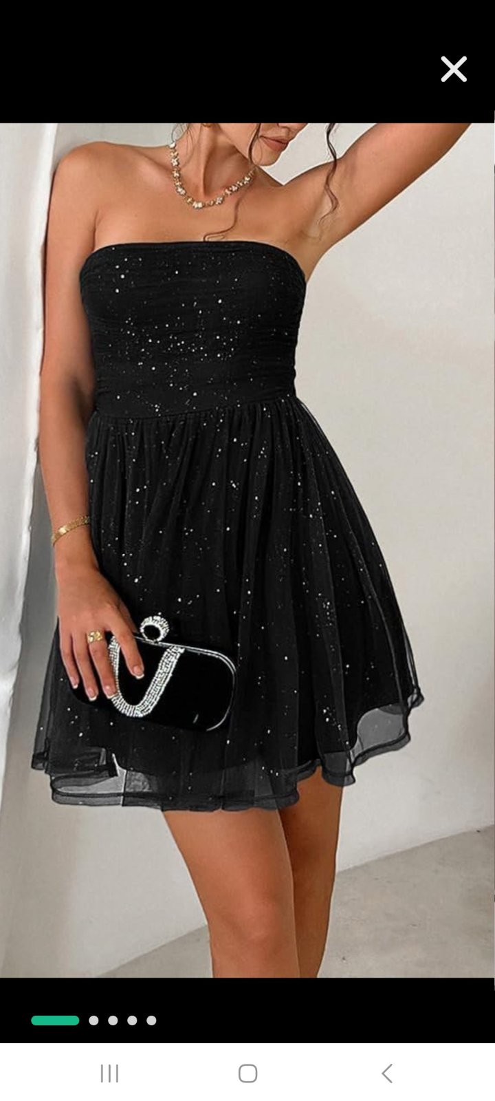 Robe de soirée noire Cache Cache présente un bustier drapé et une jupe en tulle pailleté