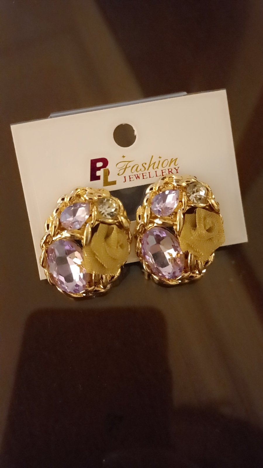 Boucles d'oreilles sont des bijoux fantaisie de marque PL Fashion Jewellery