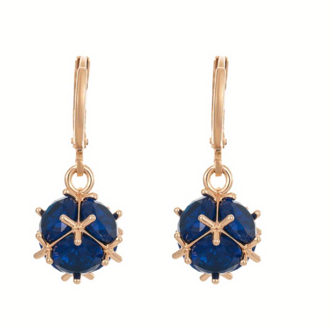 Boucles d'oreilles pendantes Xuping comportent une sphère en cage de couleur or rose avec une pierre bleue au centre