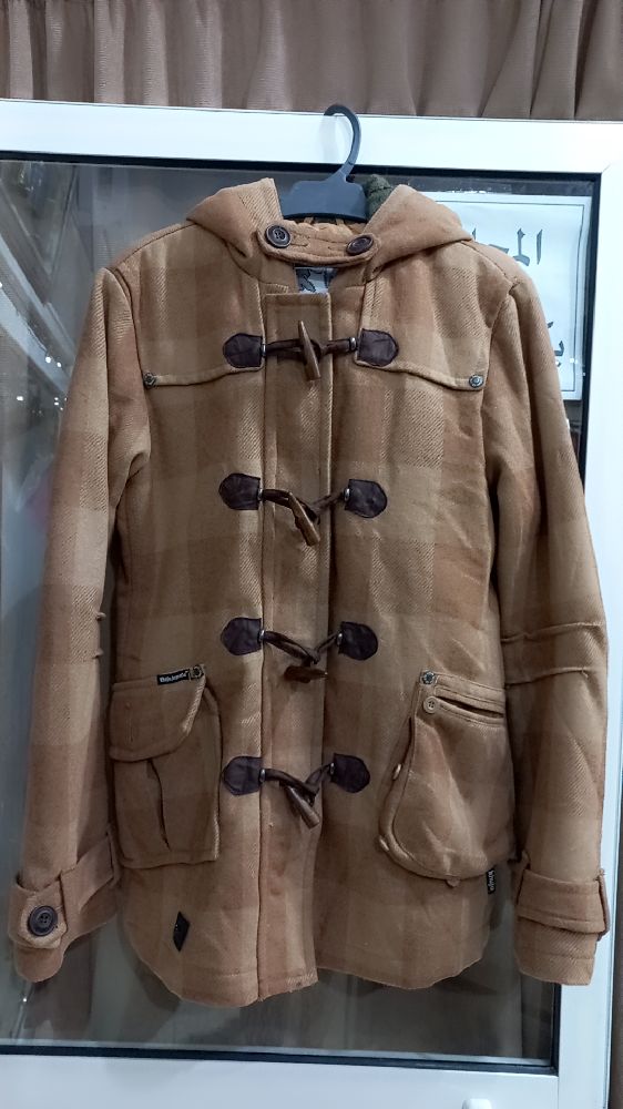 Manteau homme en très bonne état 