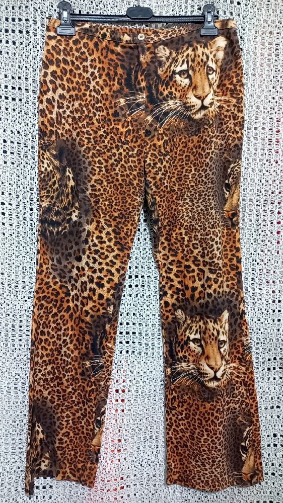 Pantalon léopard 🐆 🐆 🐆  presque neuf 