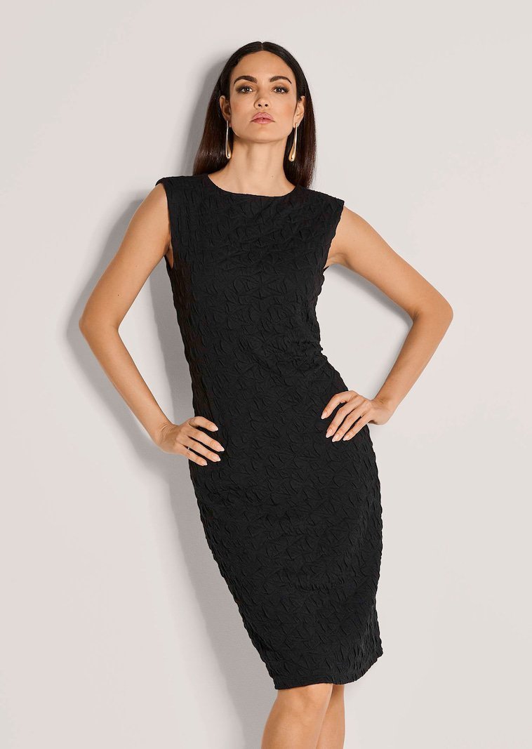 Une robe Esprit noire coton  sans manches en tissu doux, dotée d'un détail froncé drapé sur le côté