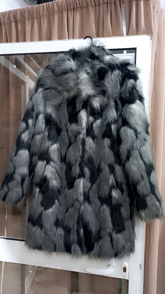 Manteau en fourrure forever21 état neuf 