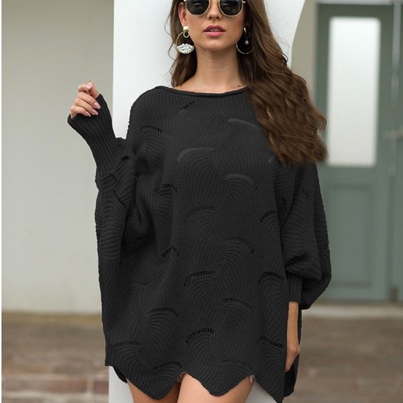 Un poncho en maille ajourée noir à manches larges et col rond état neuf ylabess M/L/XL