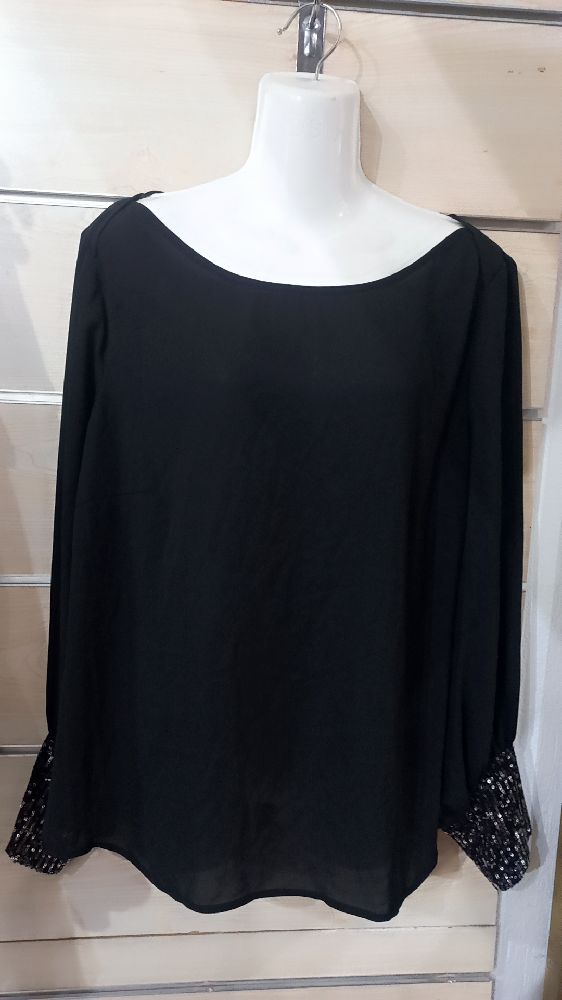 Chemise tlabess 40 /42 mal écrit la taille