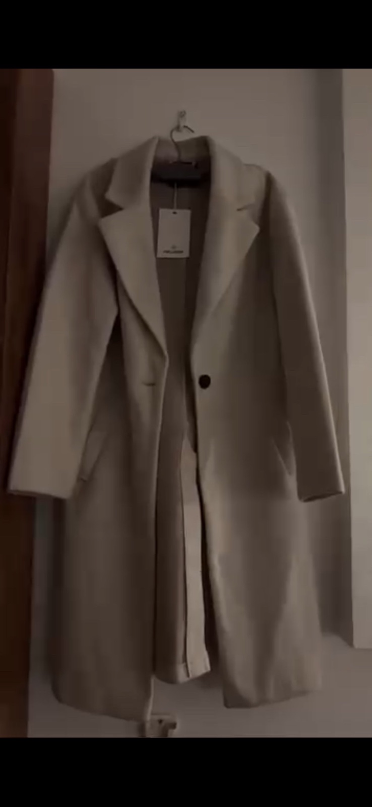 Manteau couleur creme/blanc cassé