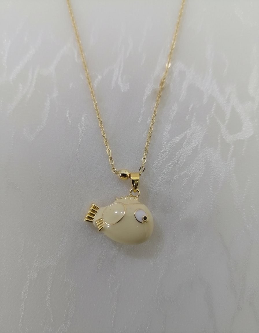 Collier inoxydable dorée motif poisson 