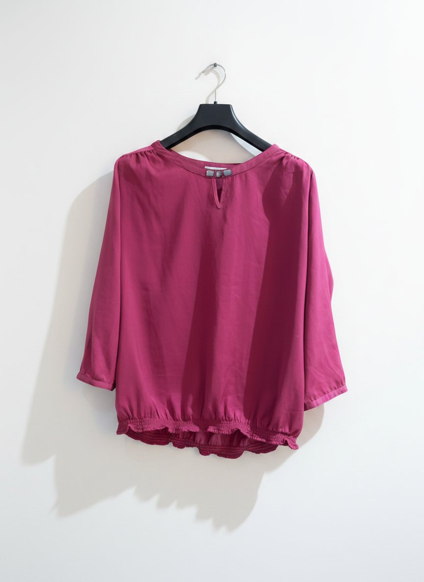 Chemisier en satin rose