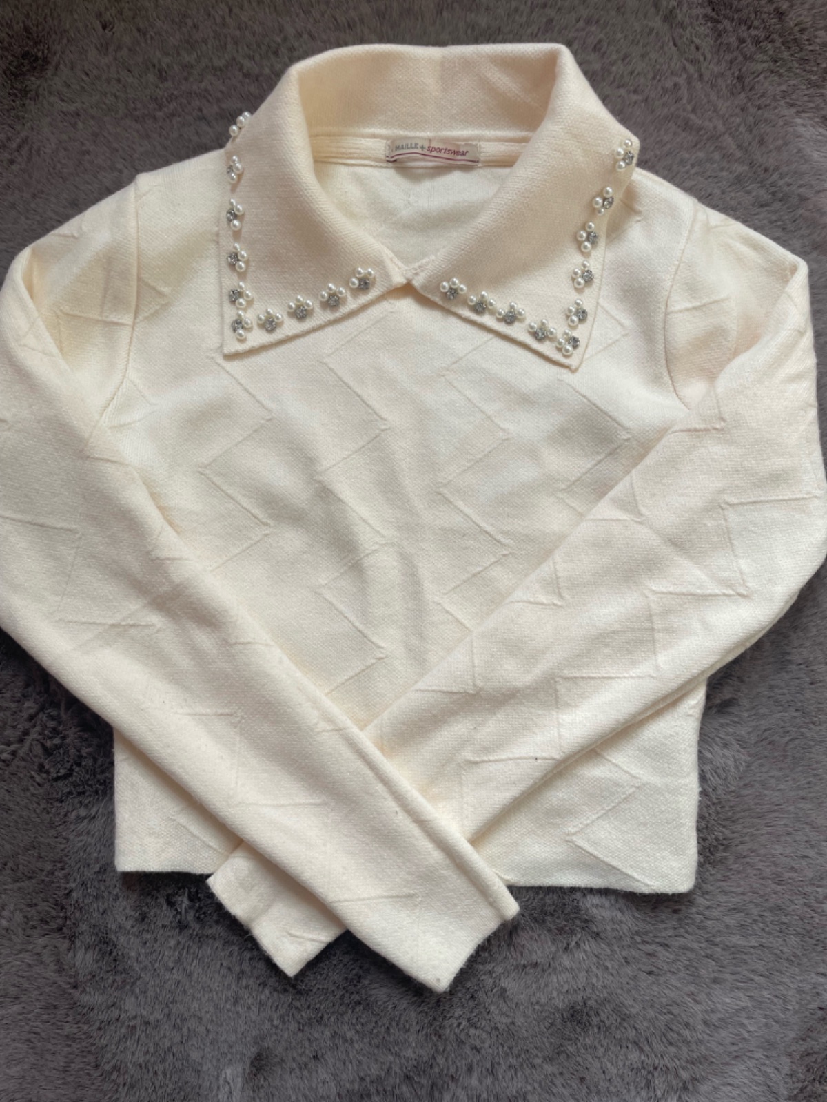 Pull taille s