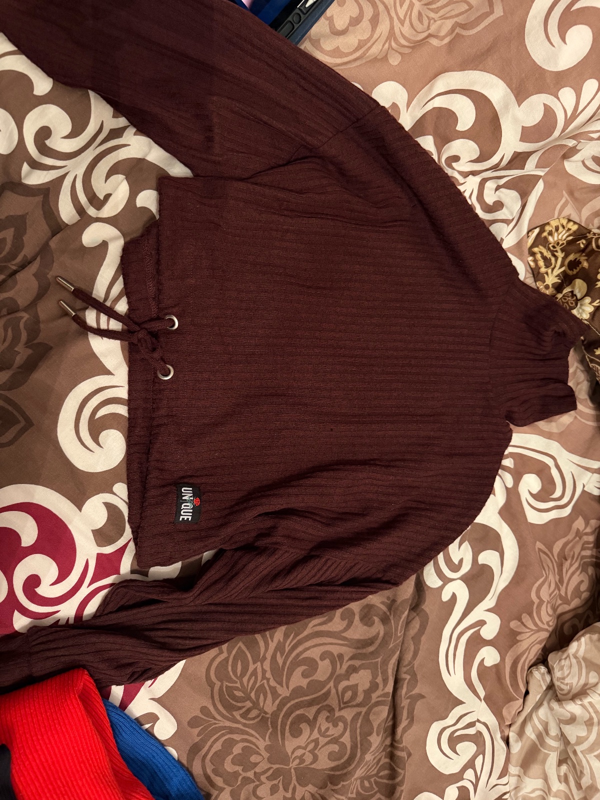 Pull rouge bordeau