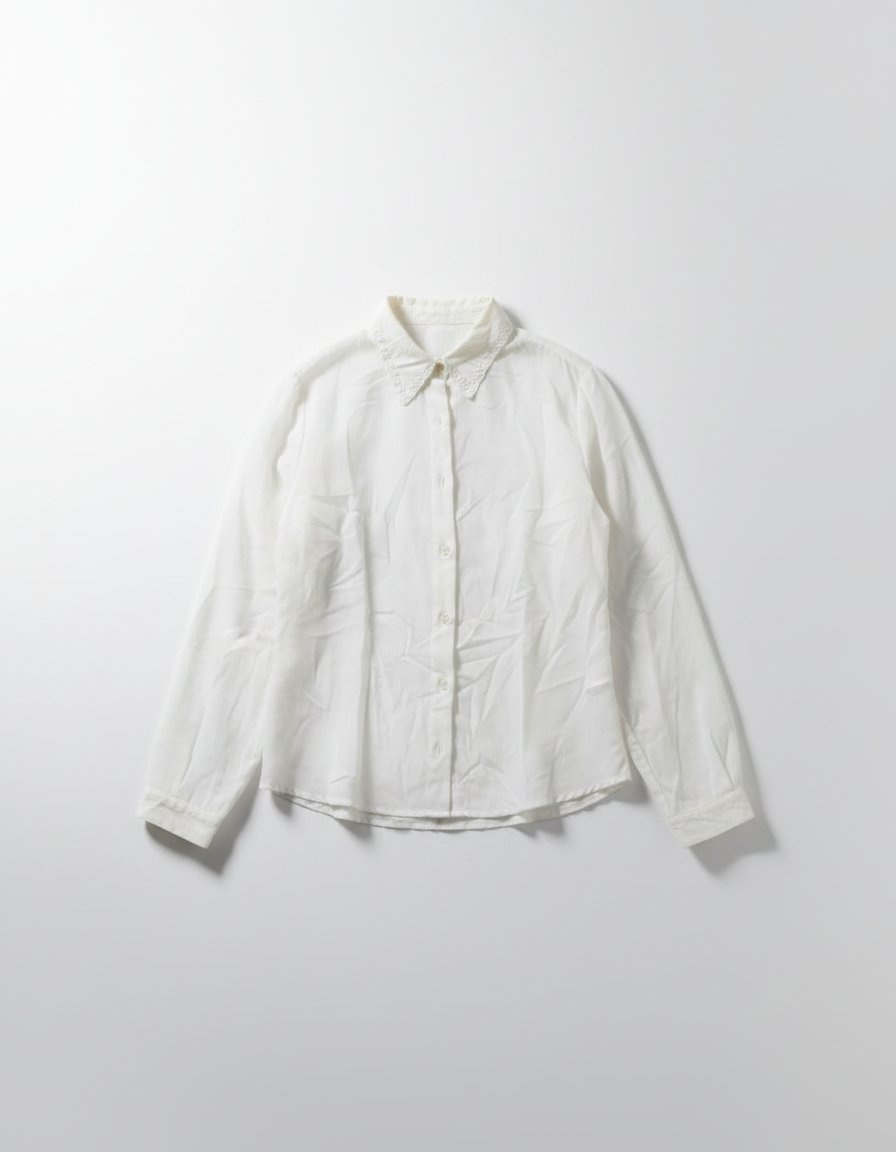 Chemise en blanc cassé en pure soie 