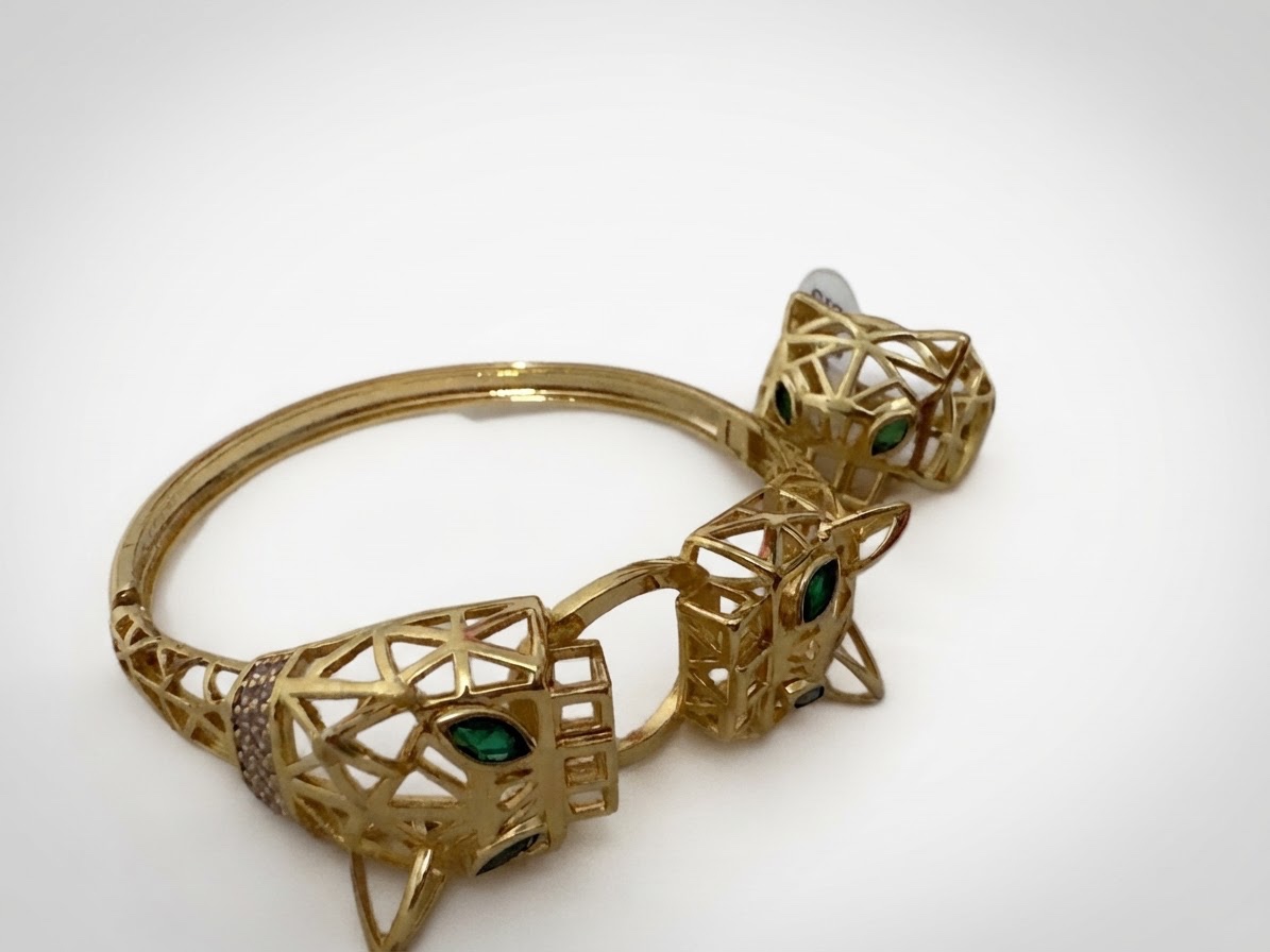 Bracelet et bague dorés motif panthère