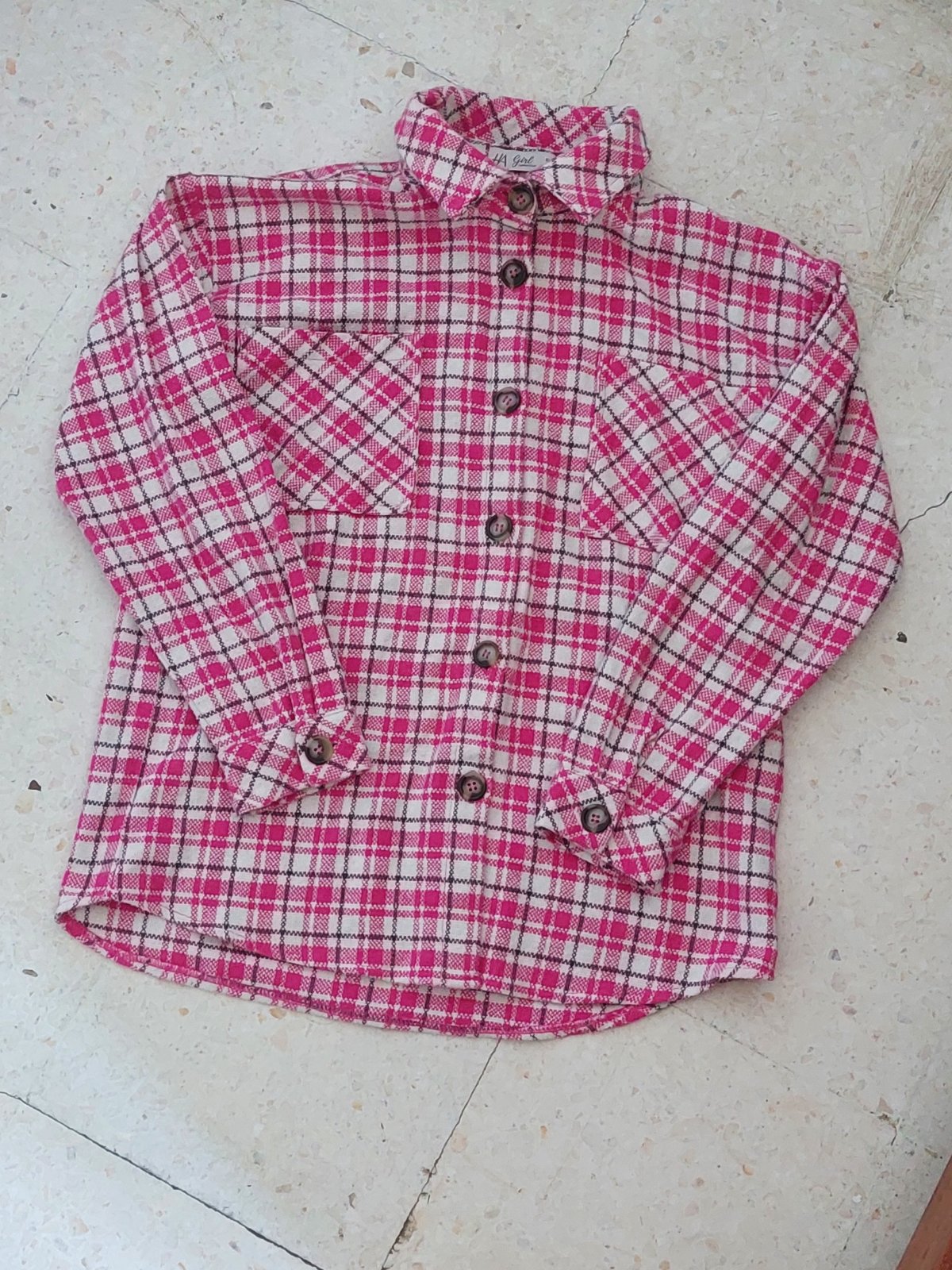 Chemise à manches longues pour fille, à carreaux roses, blancs et noirs.