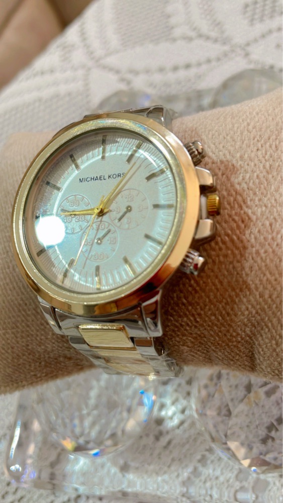 MONTRE MK INOXCIDABLE COULEUR ARGENT ET DORE