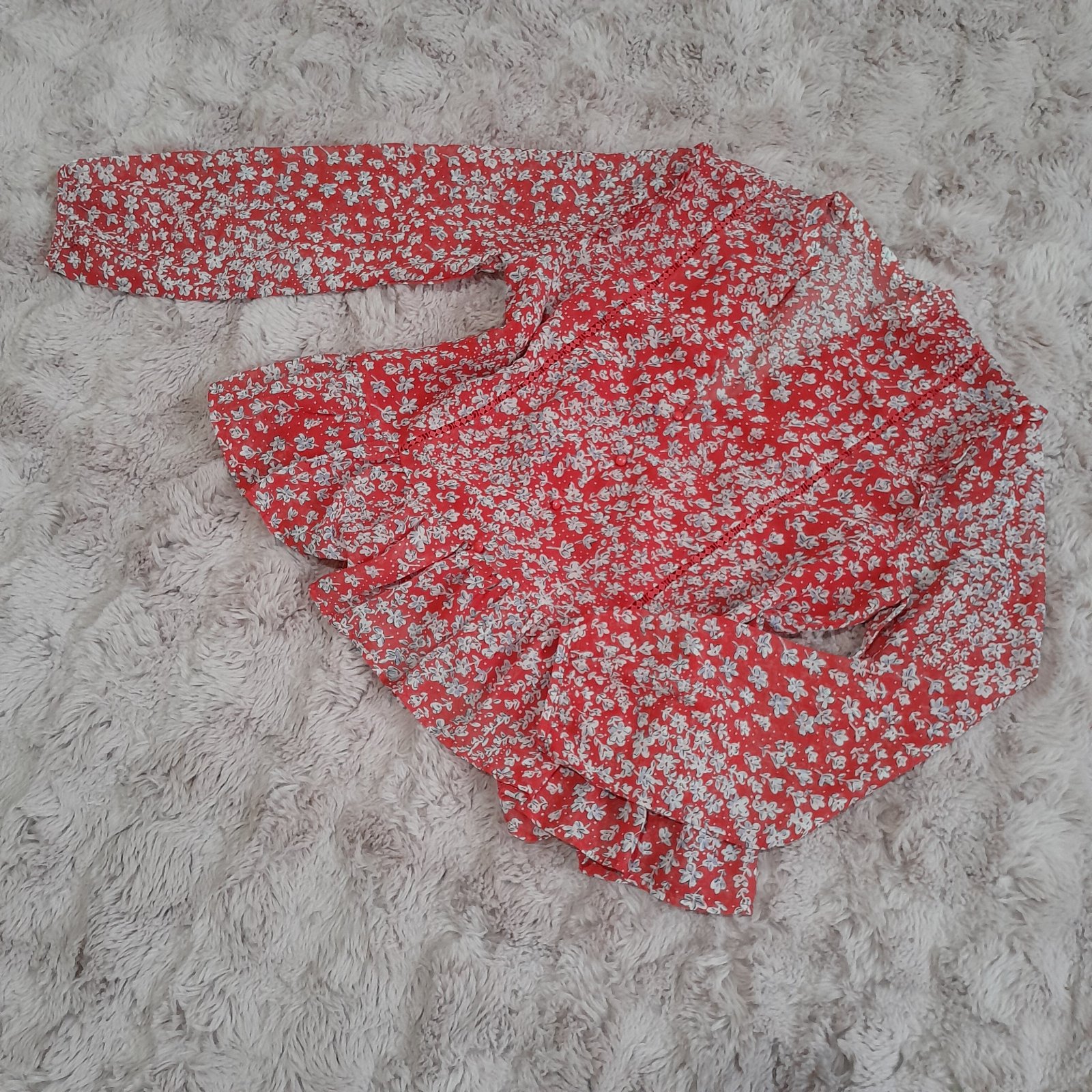 Blouse rouge à imprimé floral