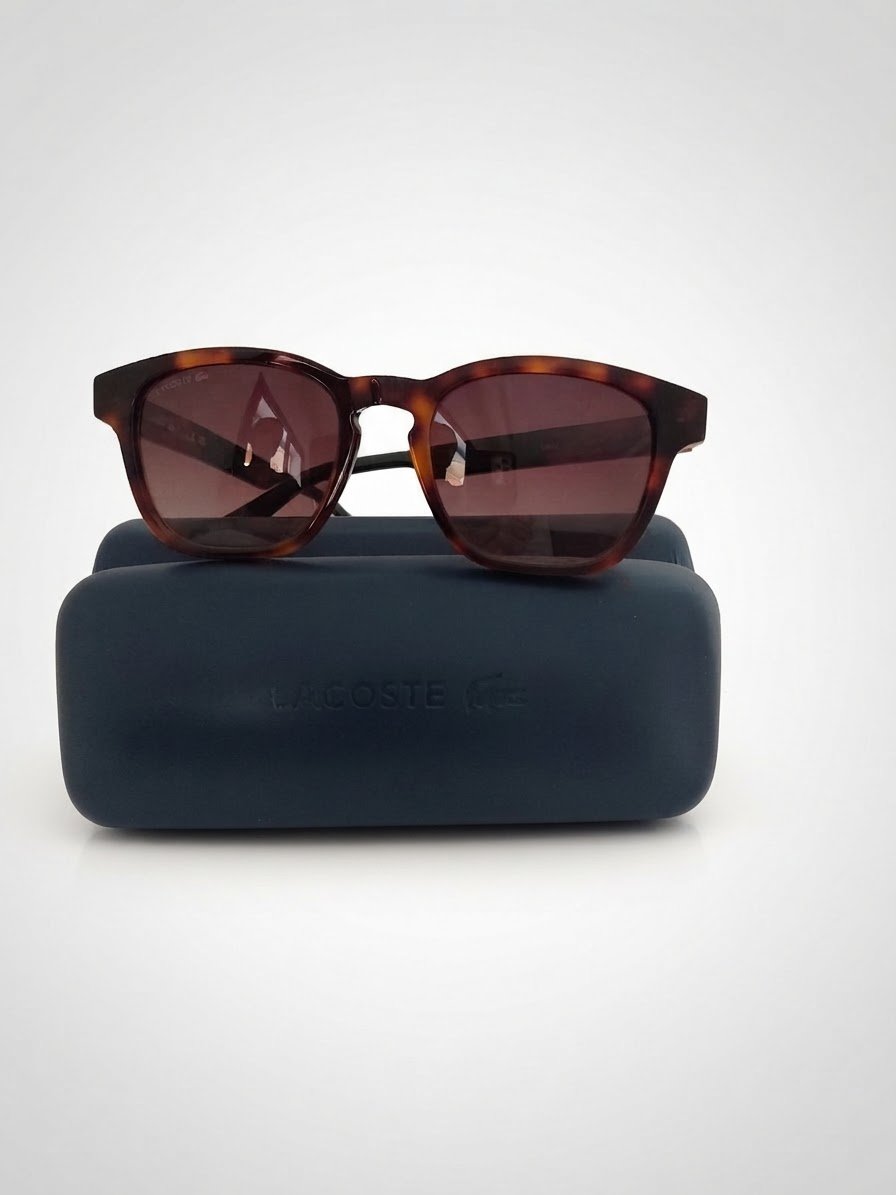 Lunettes solaires neuves Lacoste 