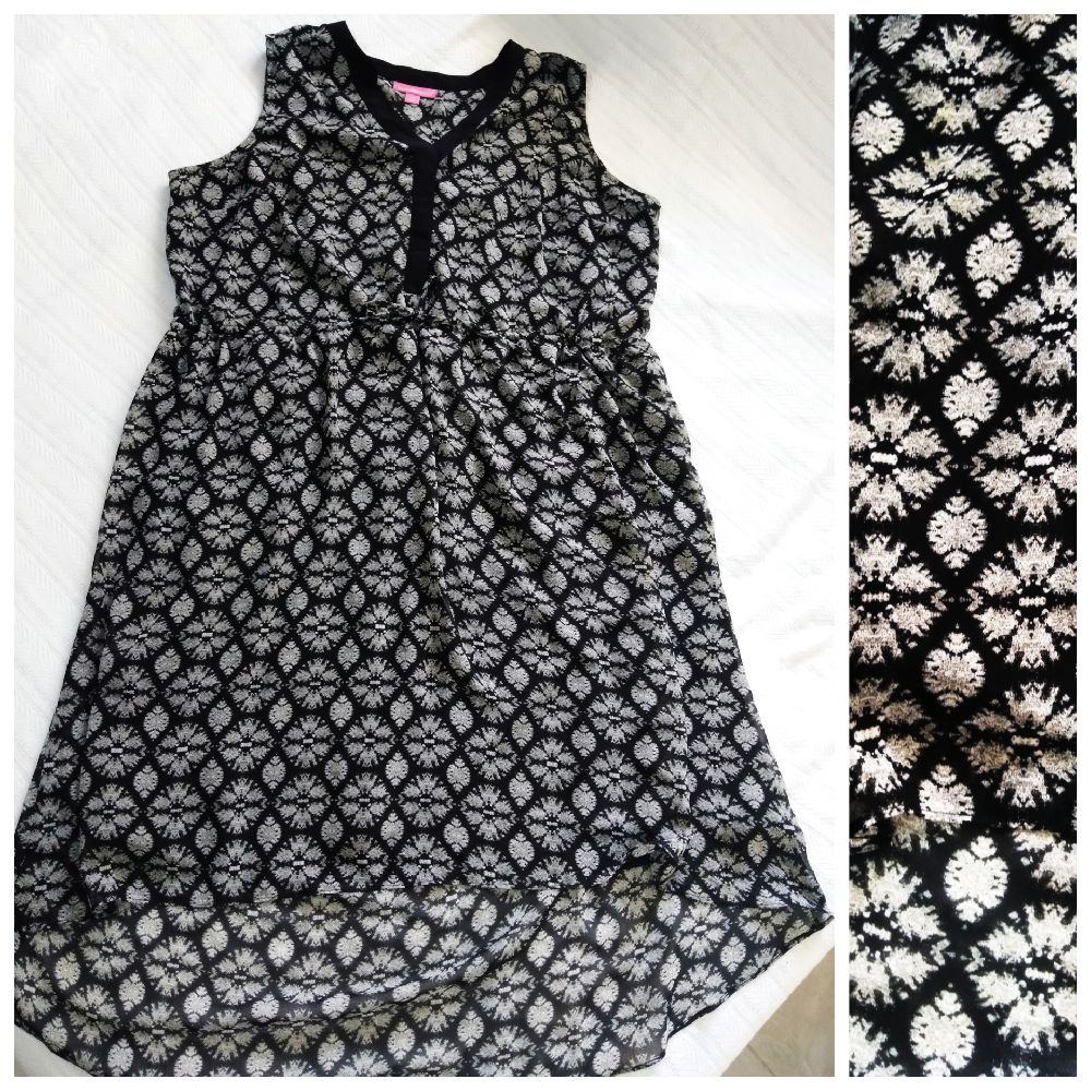 Robe noir et blanc taille 52/54 jamais portée