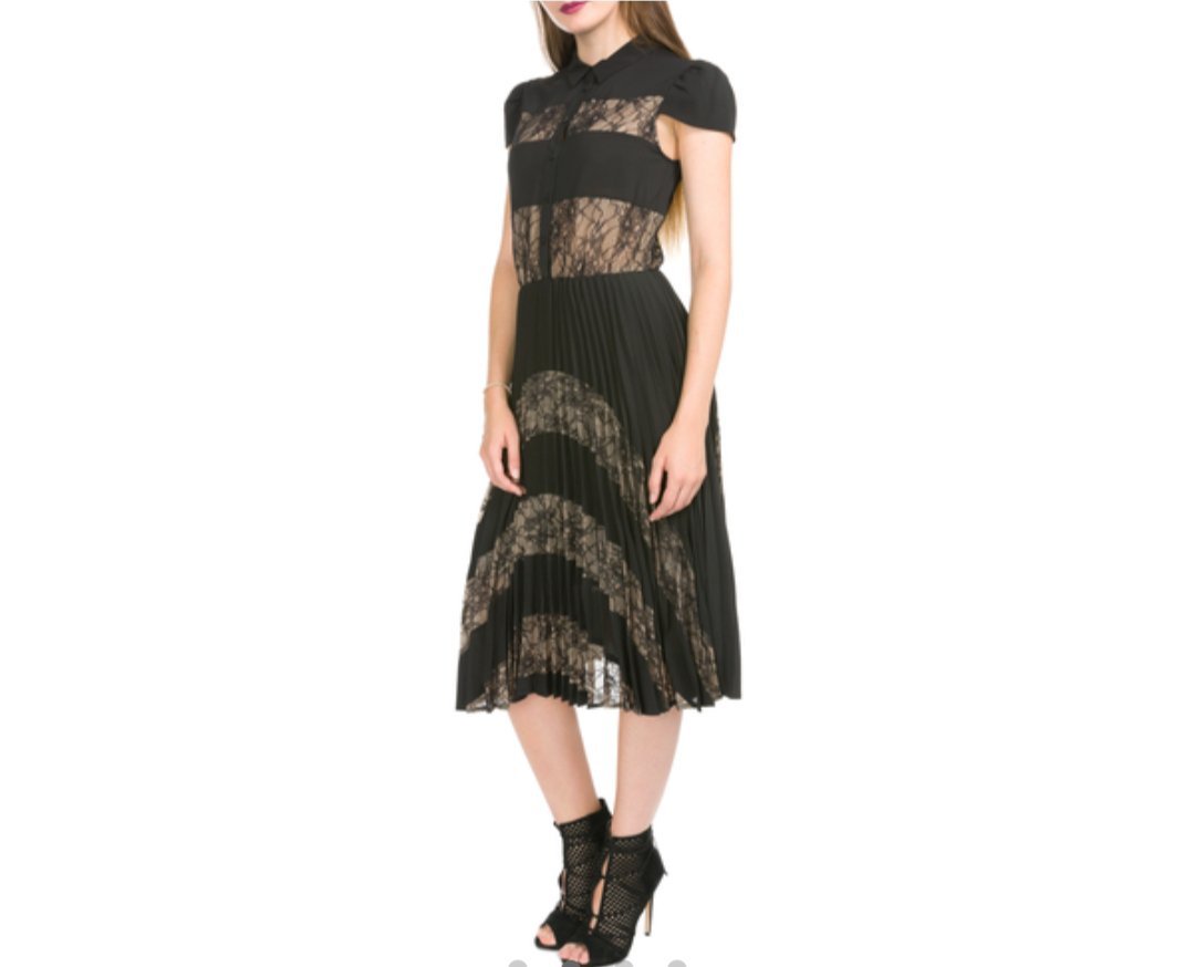 Élégante robe noire de la marque Silvian Heach est le modèle Tortimer