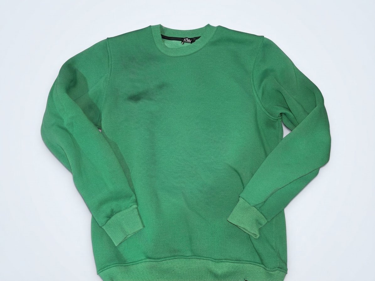 Pull vert unisexe, taille M.