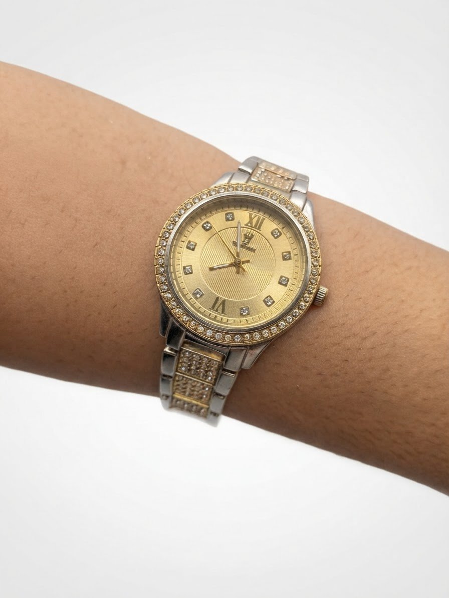 Montre dorée pour femmes avec strass et chiffres romains 