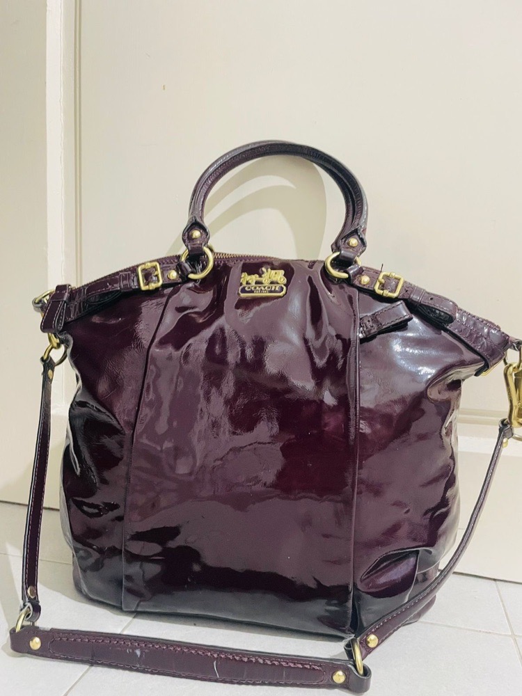 The purple COACH bag