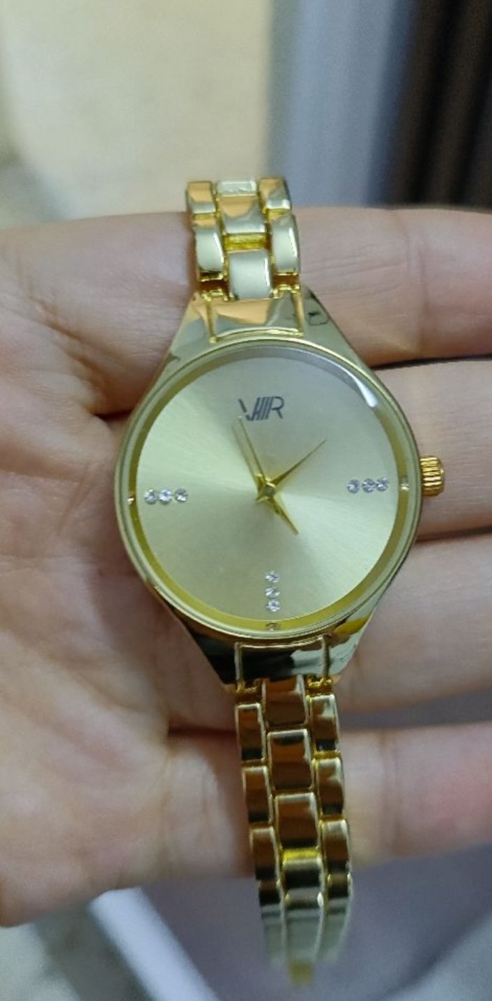Montre femme doré acier inoxydable 