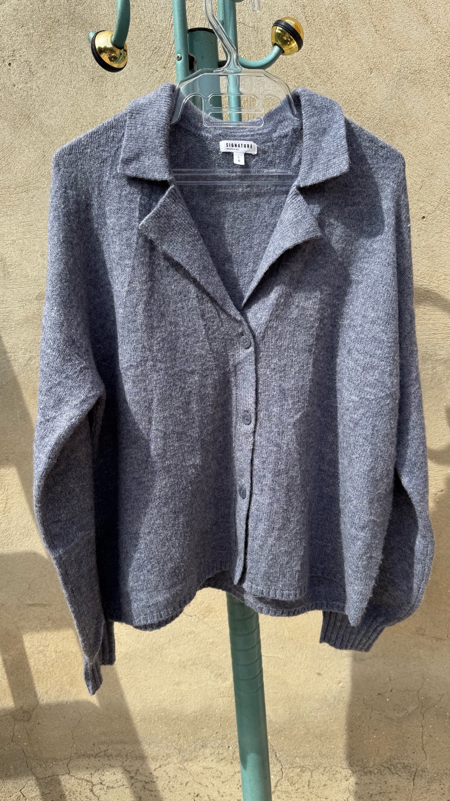 Cardigan bleu en maille en trés bonne etat