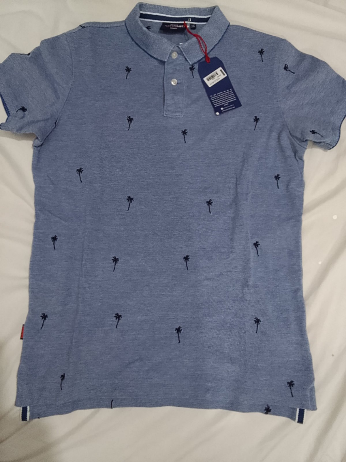 Joli pull manches courtes couleur bleu ciel pour homme 