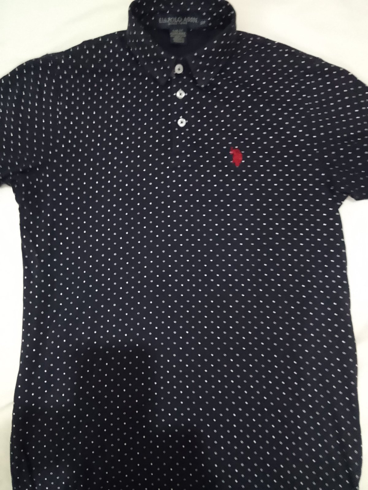 Très joli pull manches courtes de la marque Polo Assn 