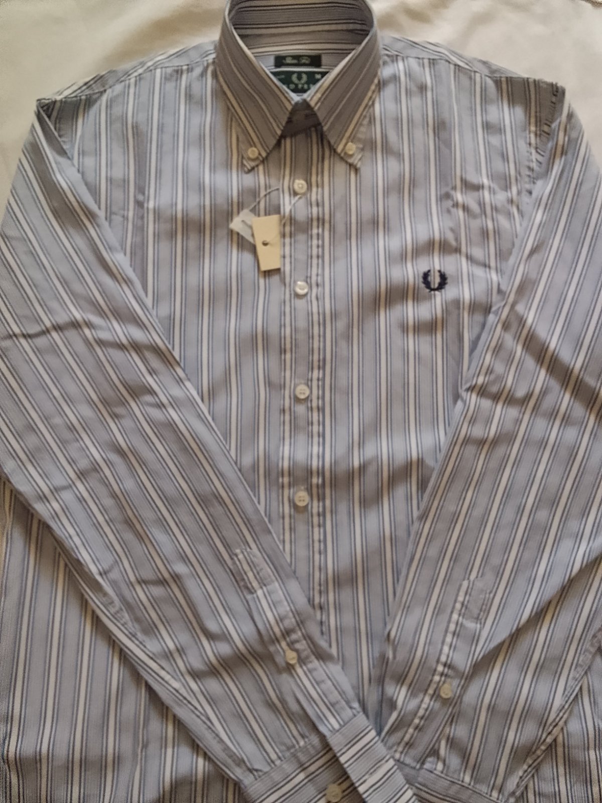 Une chemise homme très chic de la marque Fred Perry 