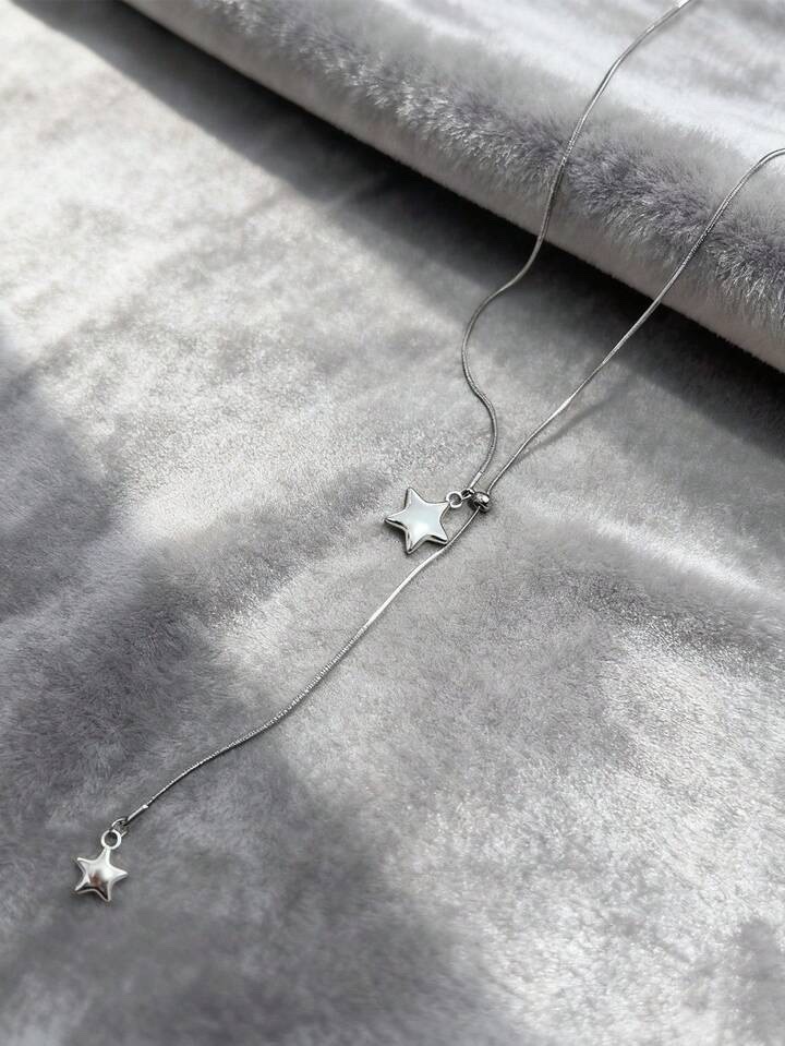 Collier long réglable avec étoile et pompon ⭐
