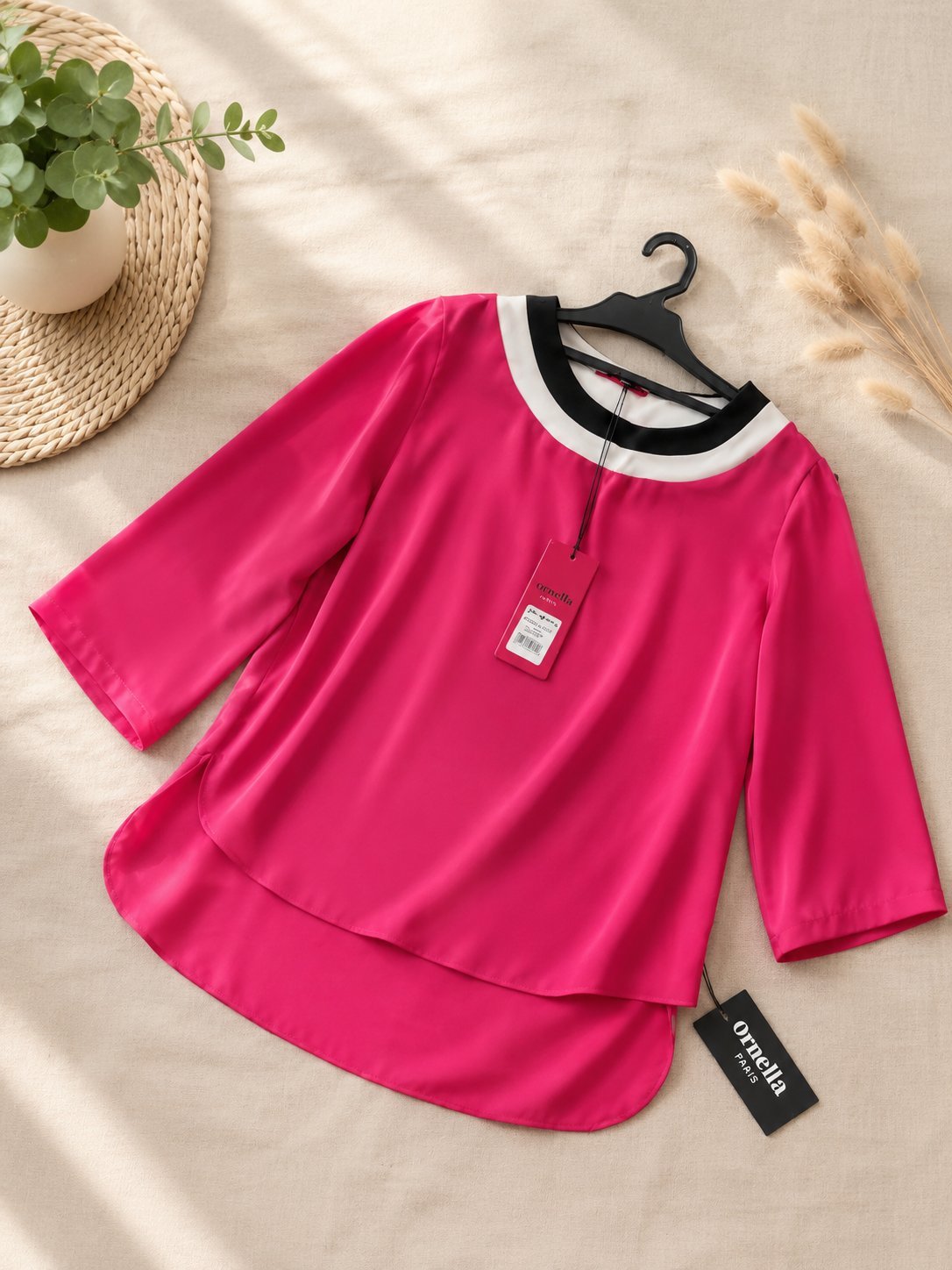 Pull rose  en tres bon état avec etiquette 
