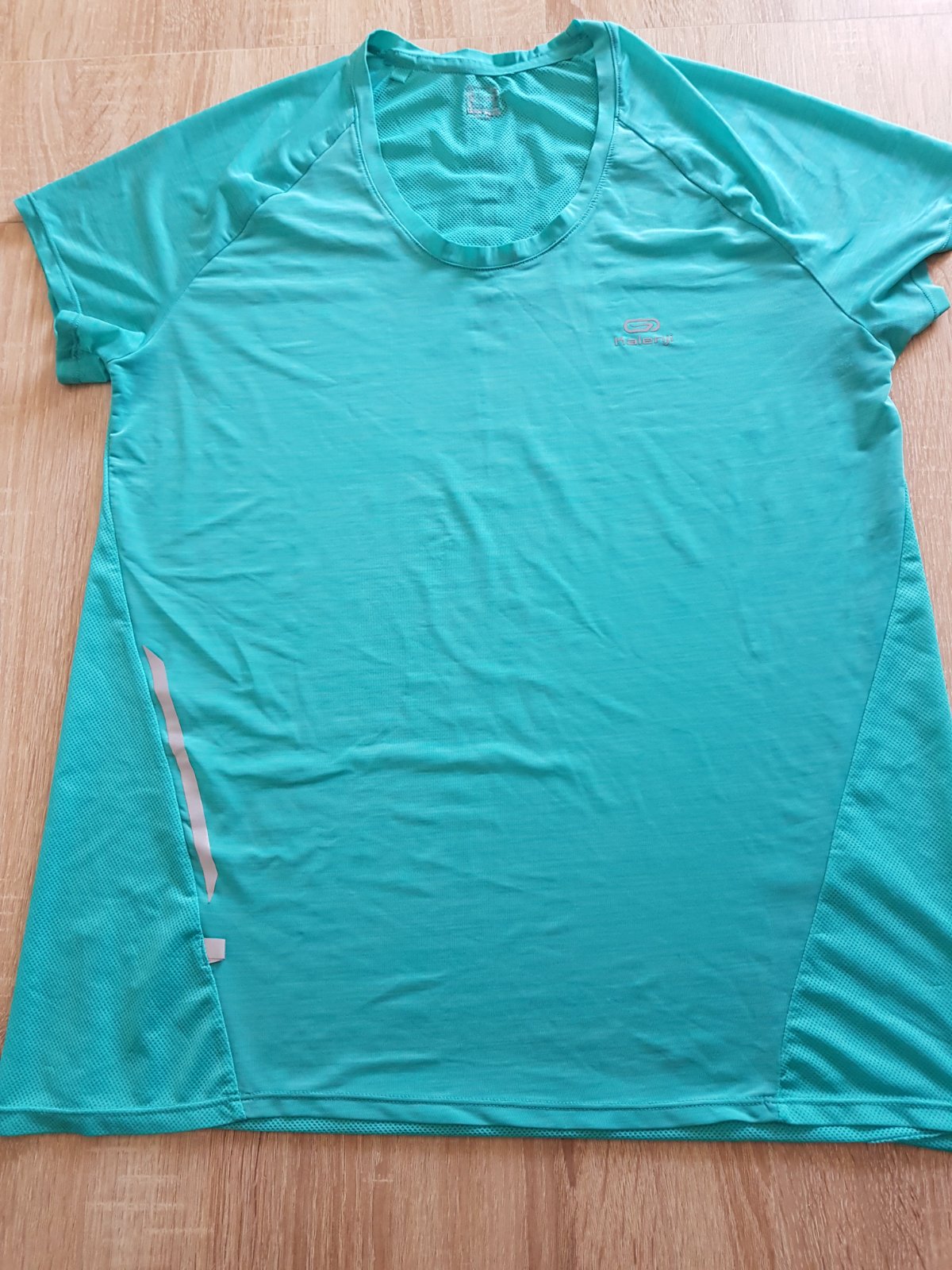 T-shirt de sport technique bleu turquoise de la marque Kalenji.