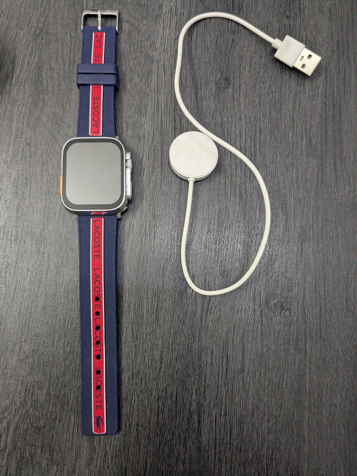 SmartWatch  avec bracelet LACOSTE 🐊 authentique orignal et chargeur 