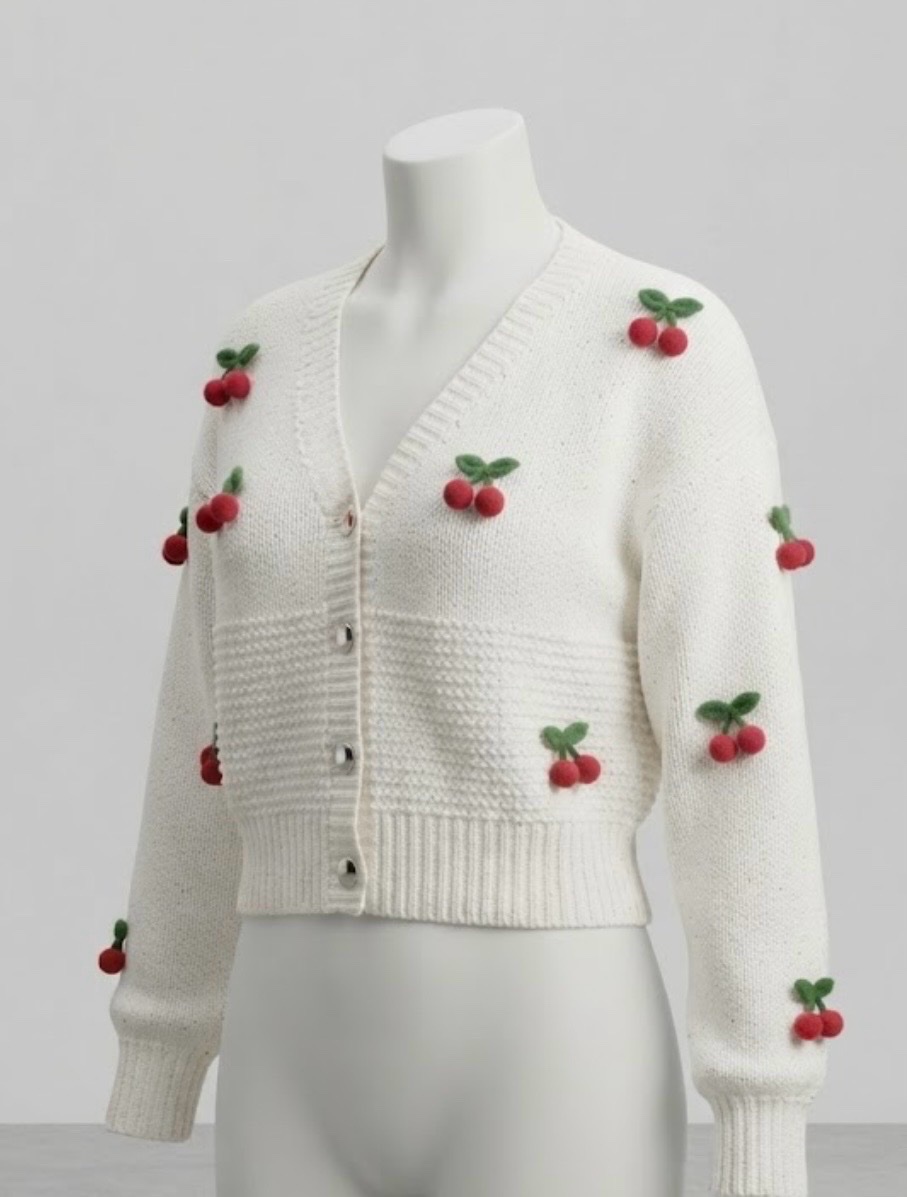 Cardigan en maille blanche à cerises 3D