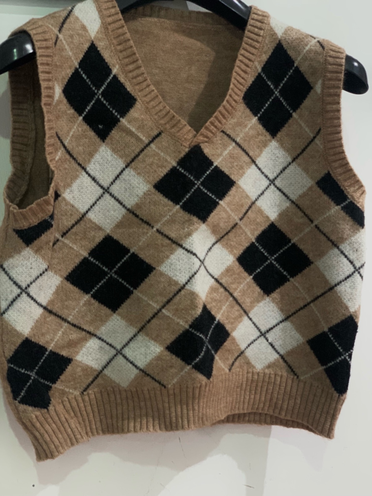 🤎 Pull sans manches à carreaux