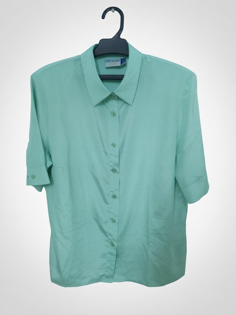 Chemise femme vert d'eau taille 42-46