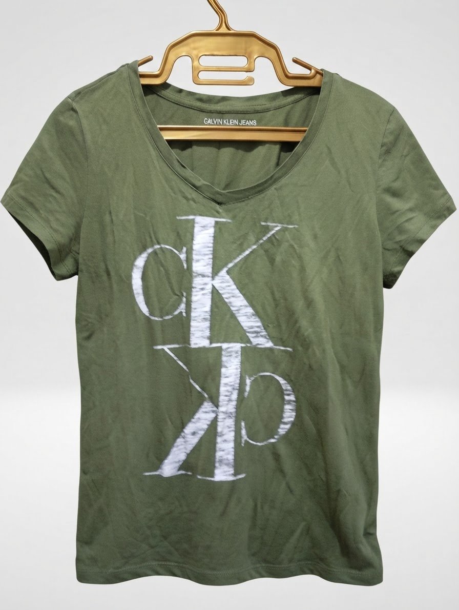 Pull vert Calvin Klein taille xs 