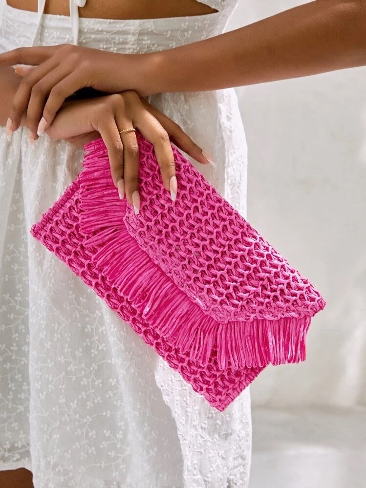 Élégante pochette rose fuchsia En paille