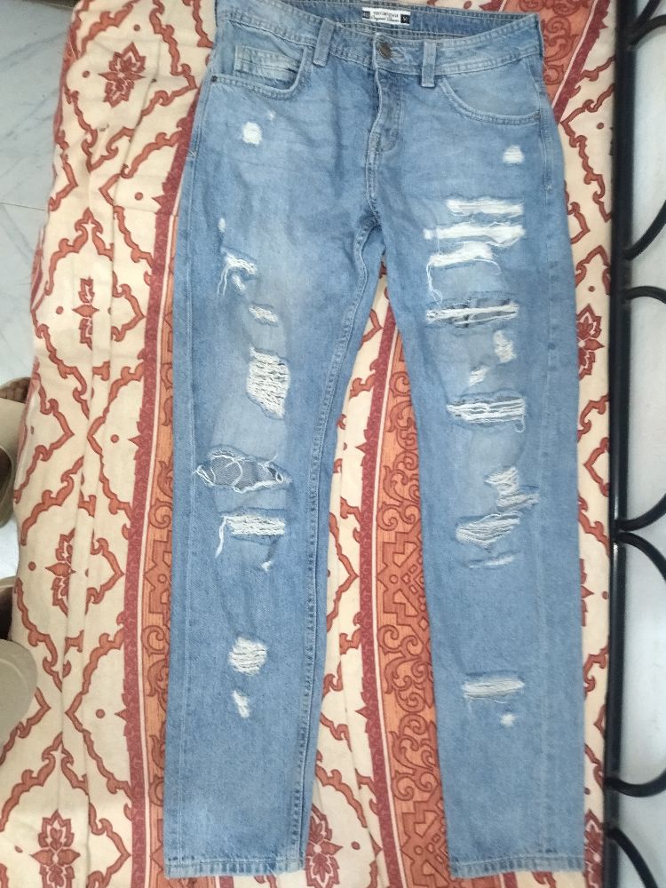 Pantalon Jean Déchiré 