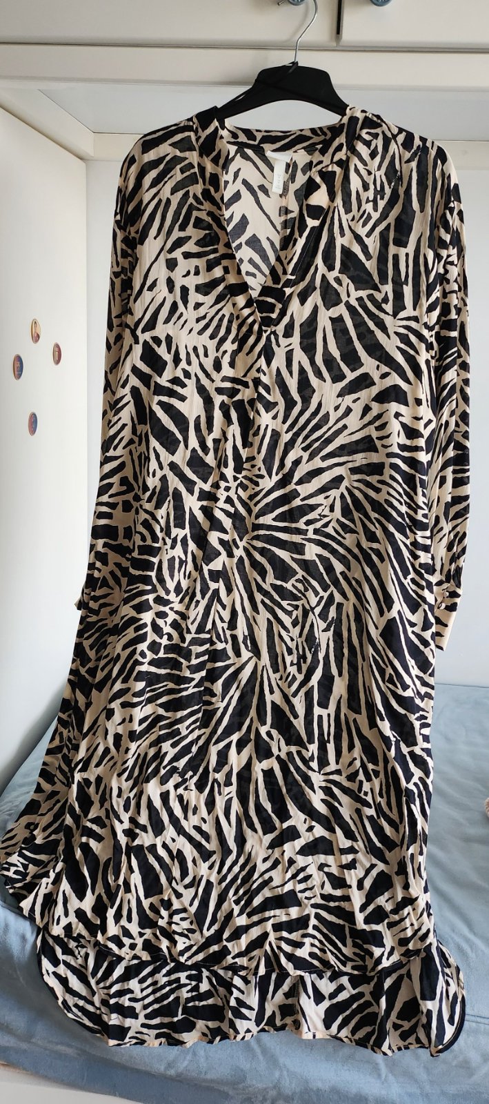 Robe tigrée noir et écrue. De la marque H&M. Taille M. 
