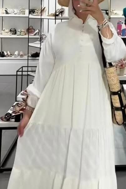 Jolie robe couleur blanc cassé importée très jolie portée 