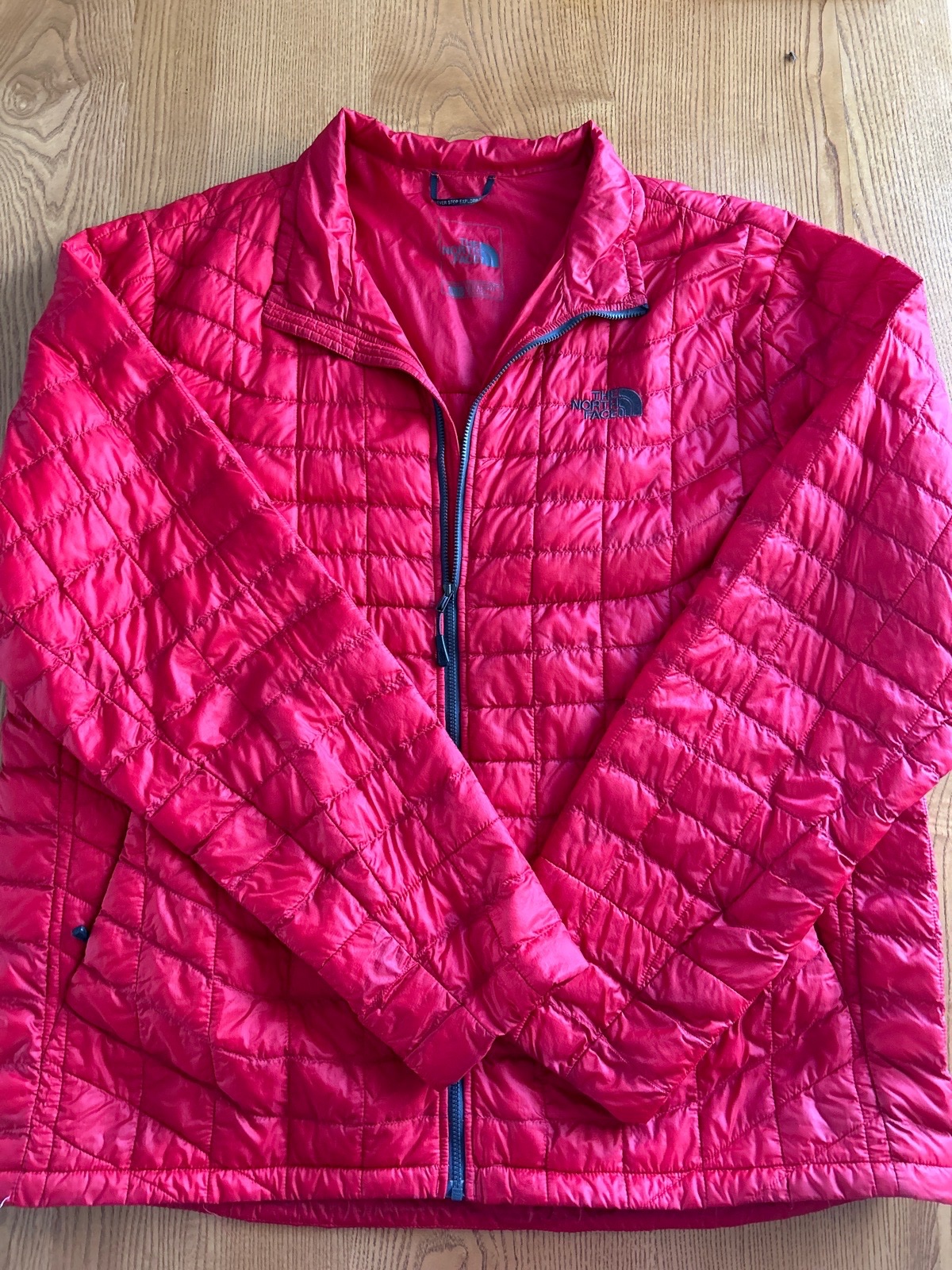 Magnifiaue doudoune rouge XL the north face