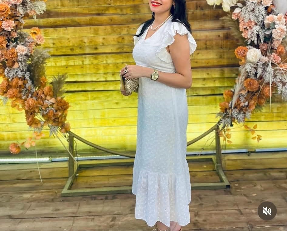 Robe blanche en broderie anglaise