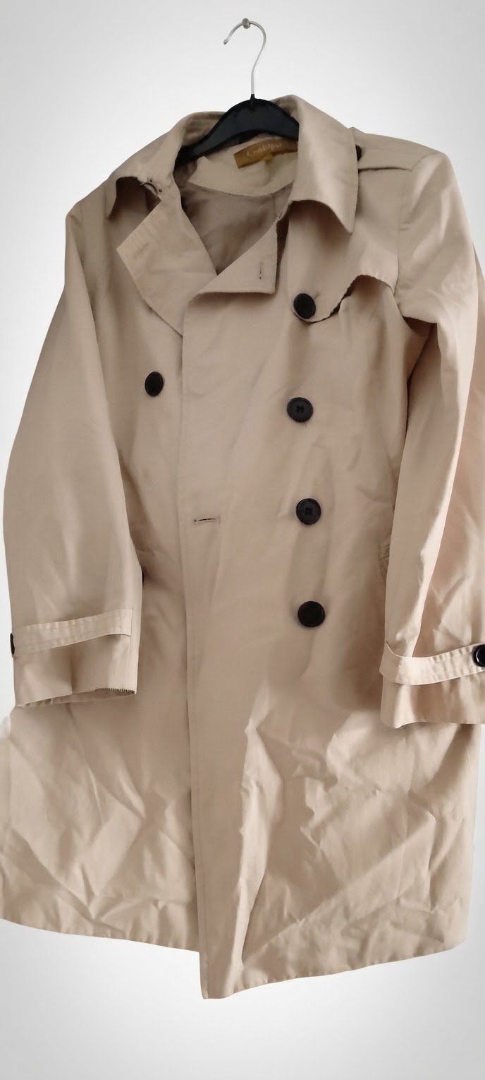 Trench taille s la marque conbipel il manque un bouton 