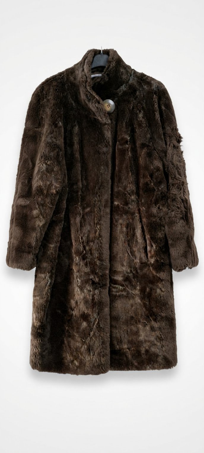 Manteau Faux fourrure mais elle  très jolie grand taille la marque monte cervino