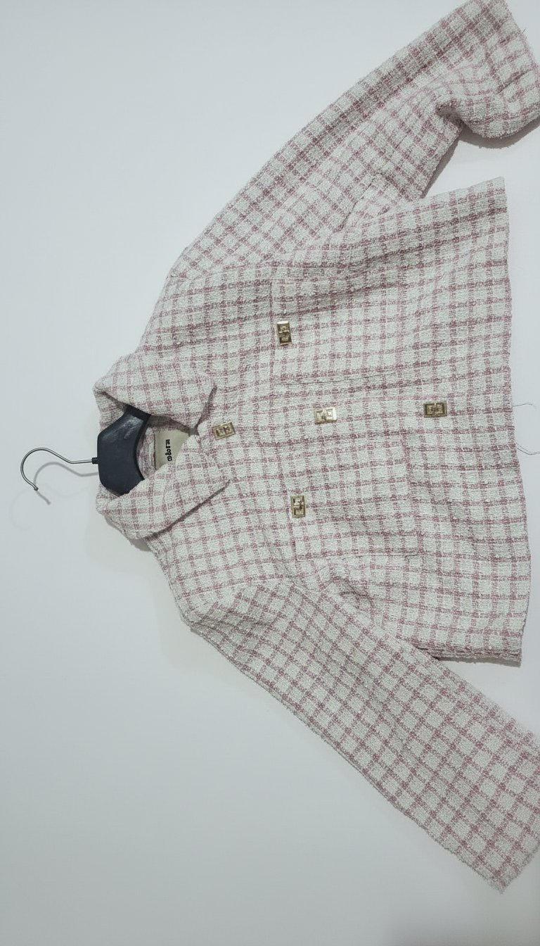 Veste de la marque "zebra" en tweed rose et blanc style Chanel