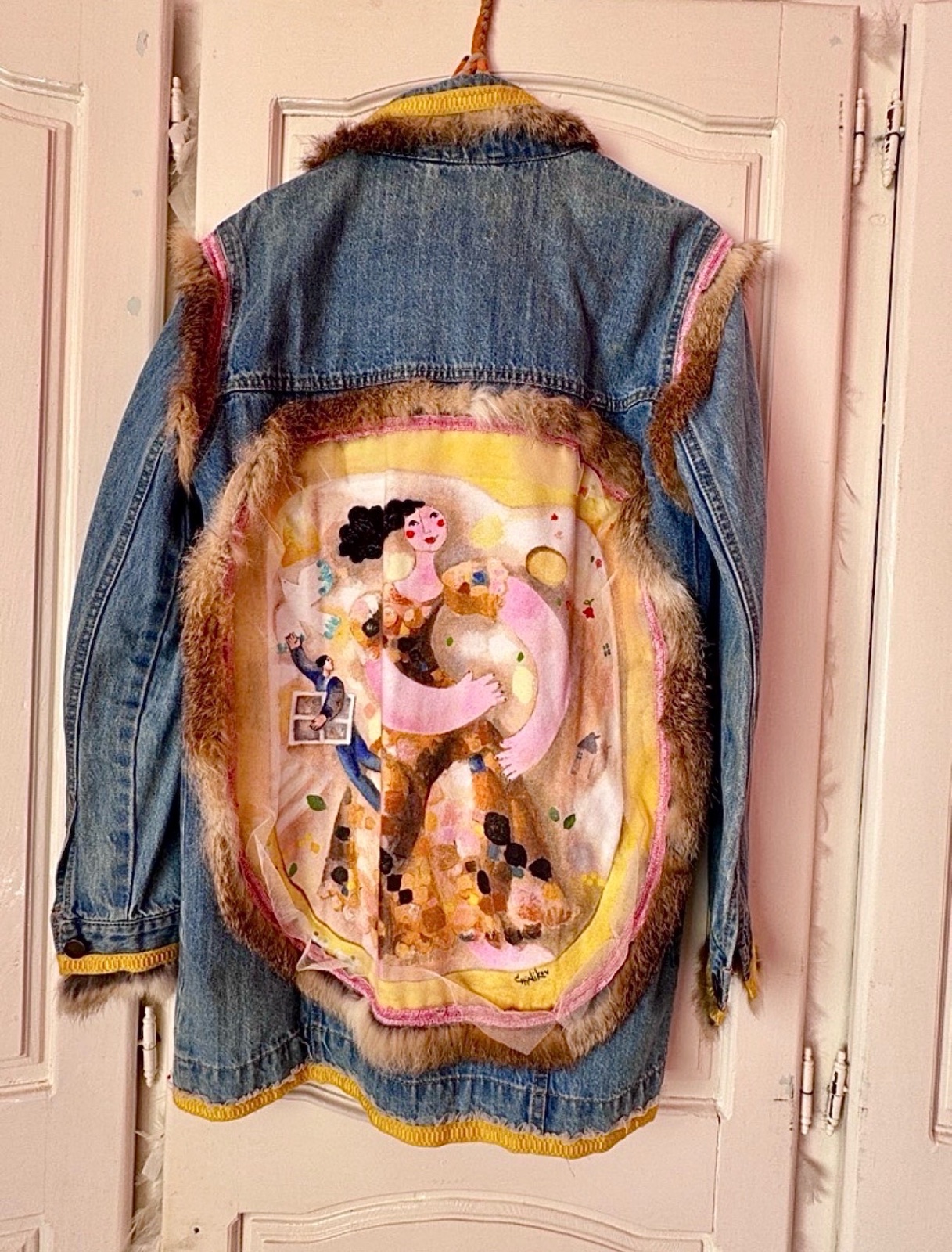 Une très belle veste djean longue personnalisée 